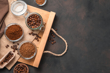 Grain, ground and instant coffee on a brown background.