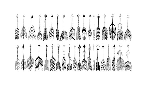 Rustic decorative arrows with feathers elements. Set of boho arrows with different tips and plumage. Hand drawn vintage vector collection. Vector black doodle elements isolated on white background