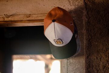 Hat on the wall.