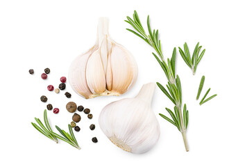 composition of garlic rosemary and peppercorns on an isolated white background
