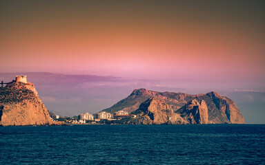 Coastline with castle on cliff, Aguilas, Spain