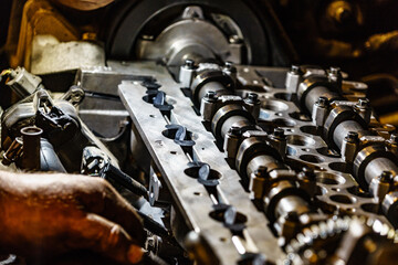Obraz na płótnie Canvas Engine closeup, cylinder head with valves detail