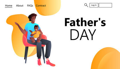 african american father playing with toddler baby at home fatherhood parenting happy father's day concept