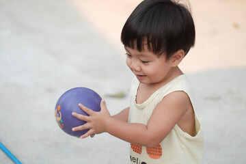 child playing with ball