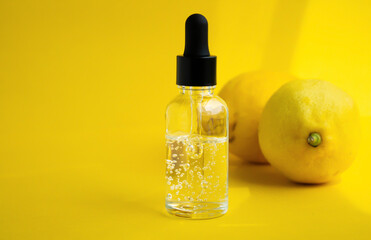 Lemon-scented oil. Cosmetic serum with lemon extract.
