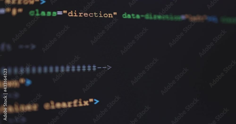 Fototapete 4K Close up shot HTML tag code on PC Monitor scroll down. Background concept for programming and coding web development.
