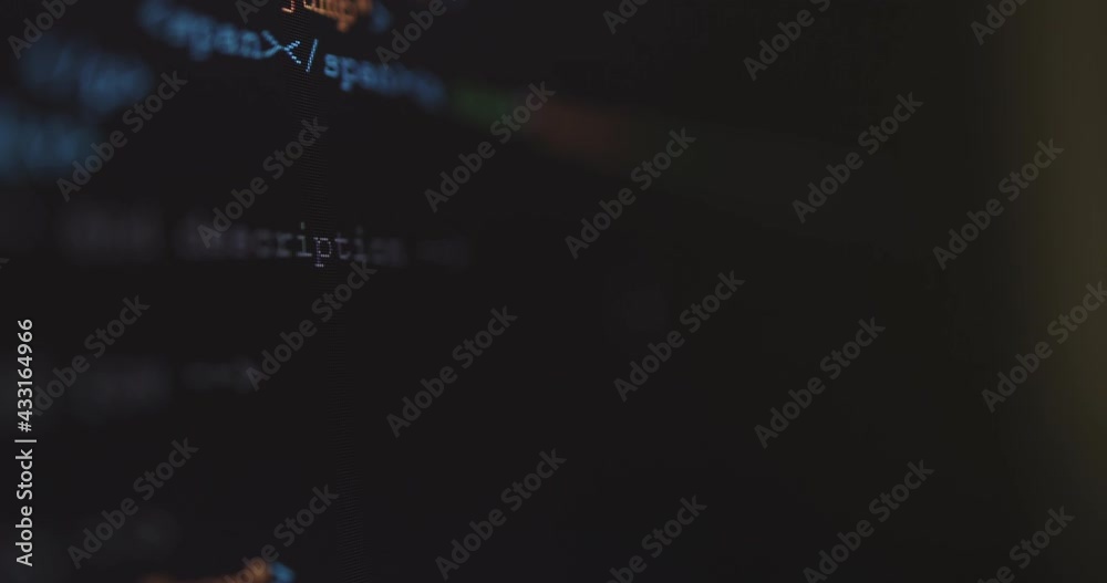 Fototapete 4K Close up shot HTML tag code on PC Monitor scroll down. Background concept for programming and coding web development.