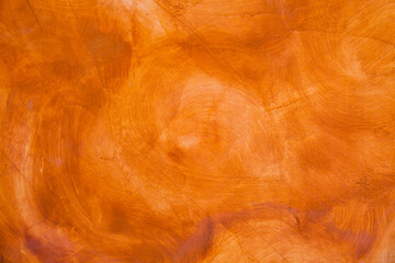 Textured wall brushed painted Background, Abstract Orange Oil Color.