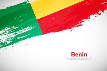 Brush painted grunge flag of Benin country. Hand drawn flag style of Benin. Creative brush stroke concept background