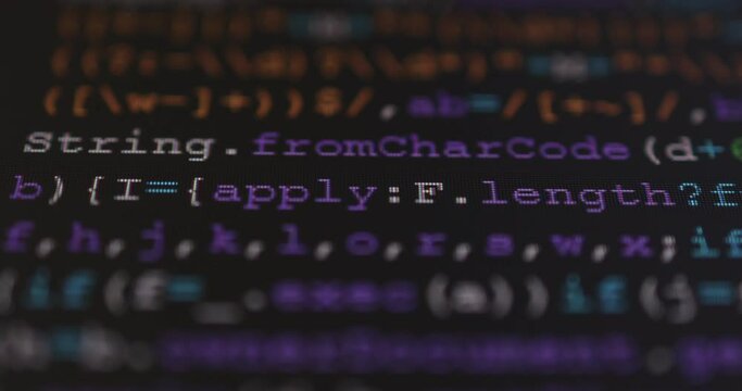 4K Close up shot programming tag code on PC Monitor scroll down. Background concept for programming and coding web development.
