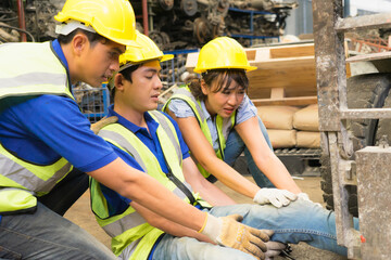 Accident of working man, forklift over leg of engineer. Asian engineer worker man was crushed by a...
