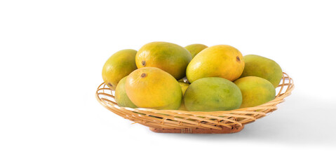 indian mangos in a basket on a white background