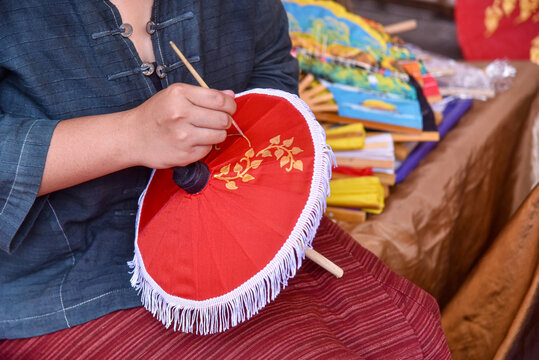 Painting on Handmade umbrella of the village Bo Sang, Chiang mai, Thailand.