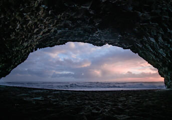 Cave on beach sunset