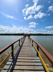 Fototapeta na wymiar wooden bridge over the sea