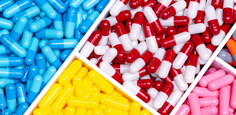 Wall mural antibiotic drugs. top view of painkiller capsule pills and supplements capsule in plastic tray. phar