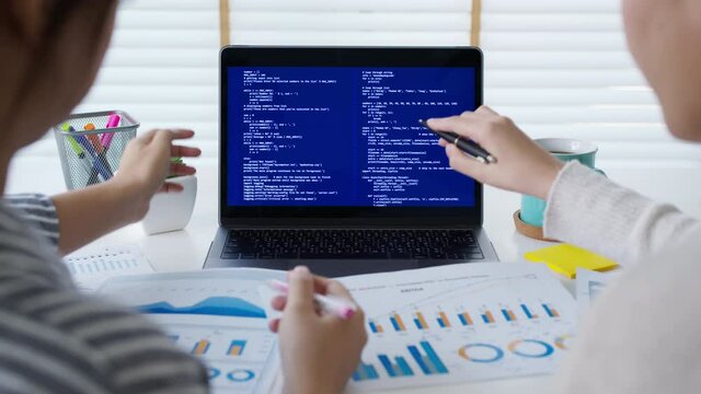 Close up two asia female people analyst coder code language laptop screen cloud online computing ai deep tech work at office desk reskill upskill, future agile cyber ux web design woman worker job.