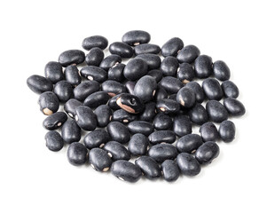 handful of black mexican beans closeup on white