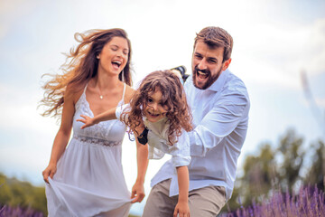 Happy family in lavender field.  This is so fun.