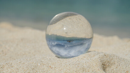 Fototapeta na wymiar crystal ball on the beach