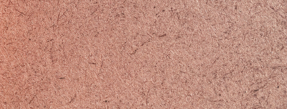 A close up of a brown fibreboard background. High quality photo