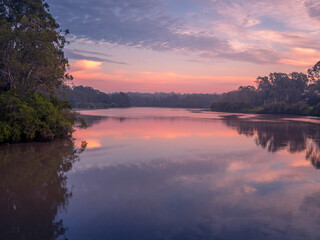 Fototapeta na wymiar Morning Clouds Reflecting on a River