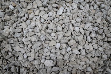 Gray stone background. Detailed little stones on the wall.