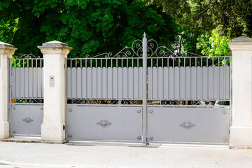 portal old grey classic metal home gate at entrance of classic old ancien house garden door in...