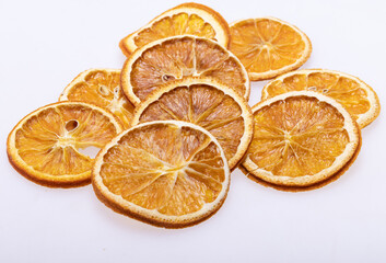 Dried orange slices. Dehydrated crispy fruits for decorating dishes for drinks, desserts and cocktails.