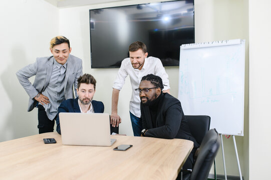 meeting of the company's executives. Discussion of a new project. Multi-racial team African American, Asian and European