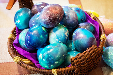 Very beautiful Easter eggs in a wicker cup.