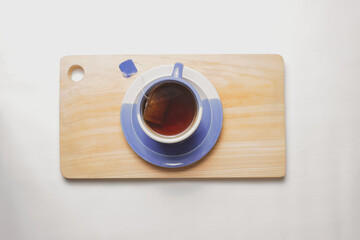 Flat lay Tea on wood on white background