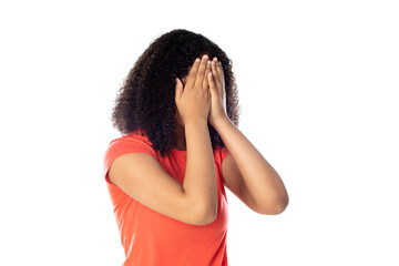 Close up of smiling little african american kid girl wearing red t-shirt looking at camera isolated on a white background