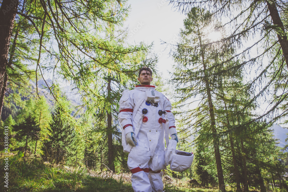 Sticker astronaut exploring a new planet. searching for a new home for humanity. concept about science and n