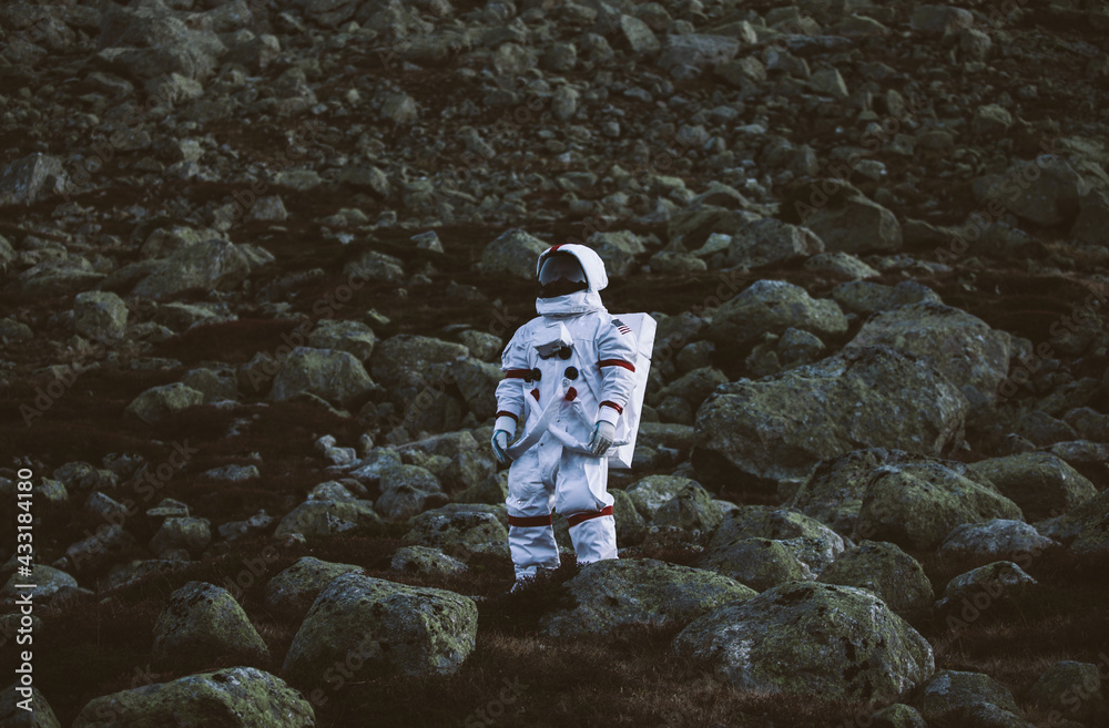Poster astronaut exploring a new planet. searching for a new home for humanity. concept about science and n