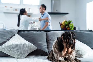 Asian young girl feeling sad to see family fighting, Domestic violence