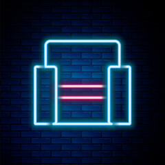 Glowing neon line Cinema chair icon isolated on brick wall background. Colorful outline concept. Vector