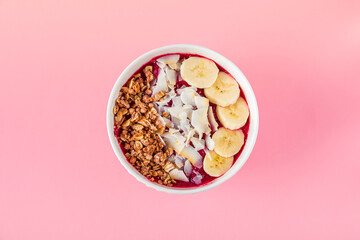 Smoothie bowl with acai, banana, blueberries, kiwi fruit and black currants. Healthy super food with fresh fruit. Vegetarian and organic nutritional food