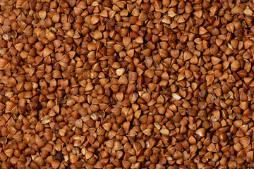 Macro Photo food buckwheat groats. Texture background grain buckwheat groats. Image food product porridge buckwheat.