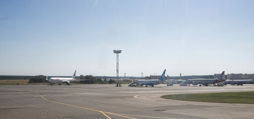 Fototapeta na wymiar Domodedovo airport. Aircraft are preparing to fly