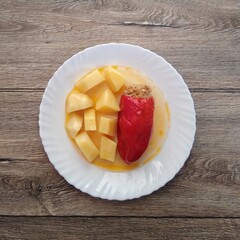 stewed stuffed red pepper with potatoes