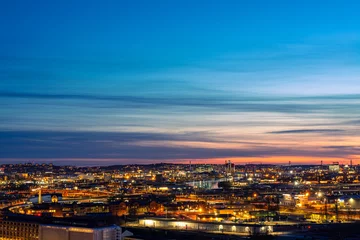 Foto op Canvas City skyline at sunset © Ludvig