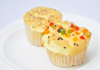 Delicious cereal cupcakes on white background
