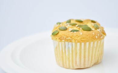 Delicious cereal cupcakes on white background