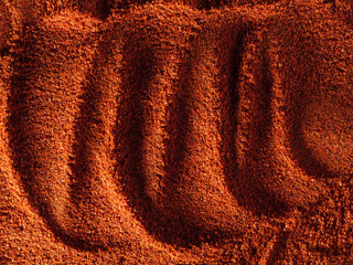 Red ground paprika, texture, top view.