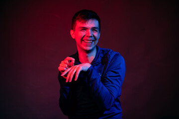 Portrait of a man with red and blue light