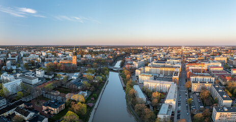 Aerial panorama of Turku city center, Cathedral of Turku and Aura river in spring in Finland. - 433195161