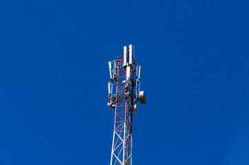 Mobile tower 5G against the blue sky