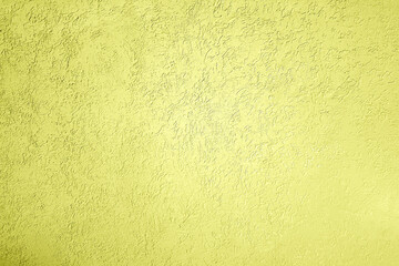 Plastered wall texture, yellow tone colored background