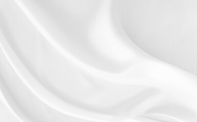 White gray satin texture that is white silver fabric silk background with beautiful soft blur pattern natural.